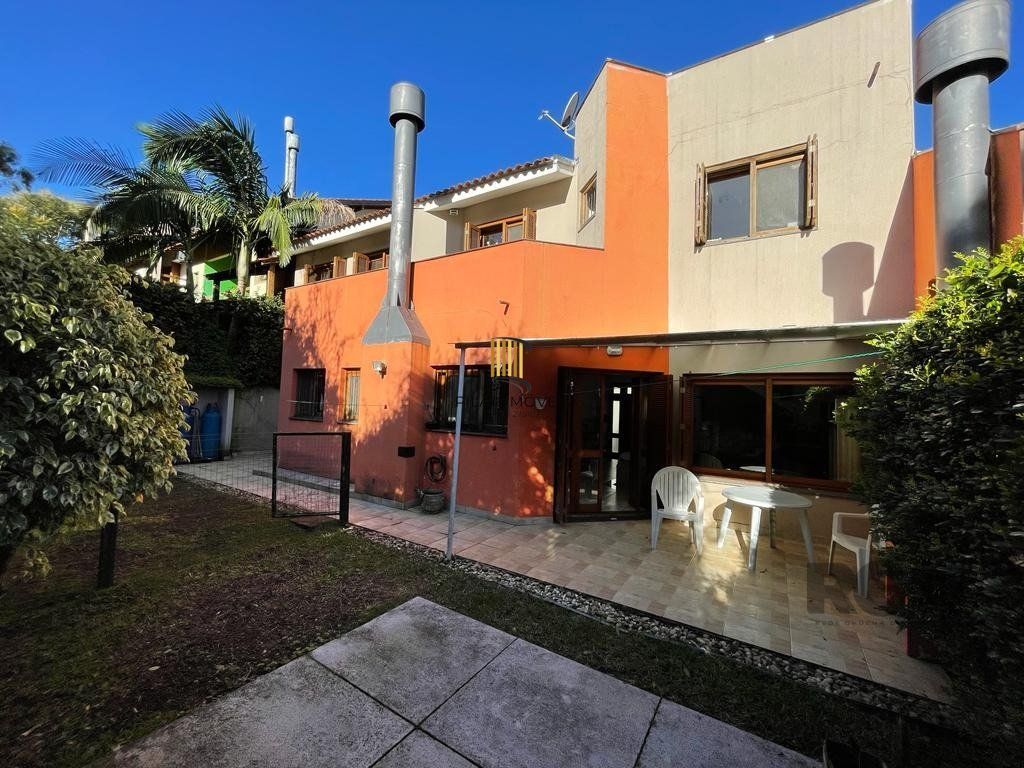 Casa de Condomínio 4 dormitórios no bairro Cavalhada