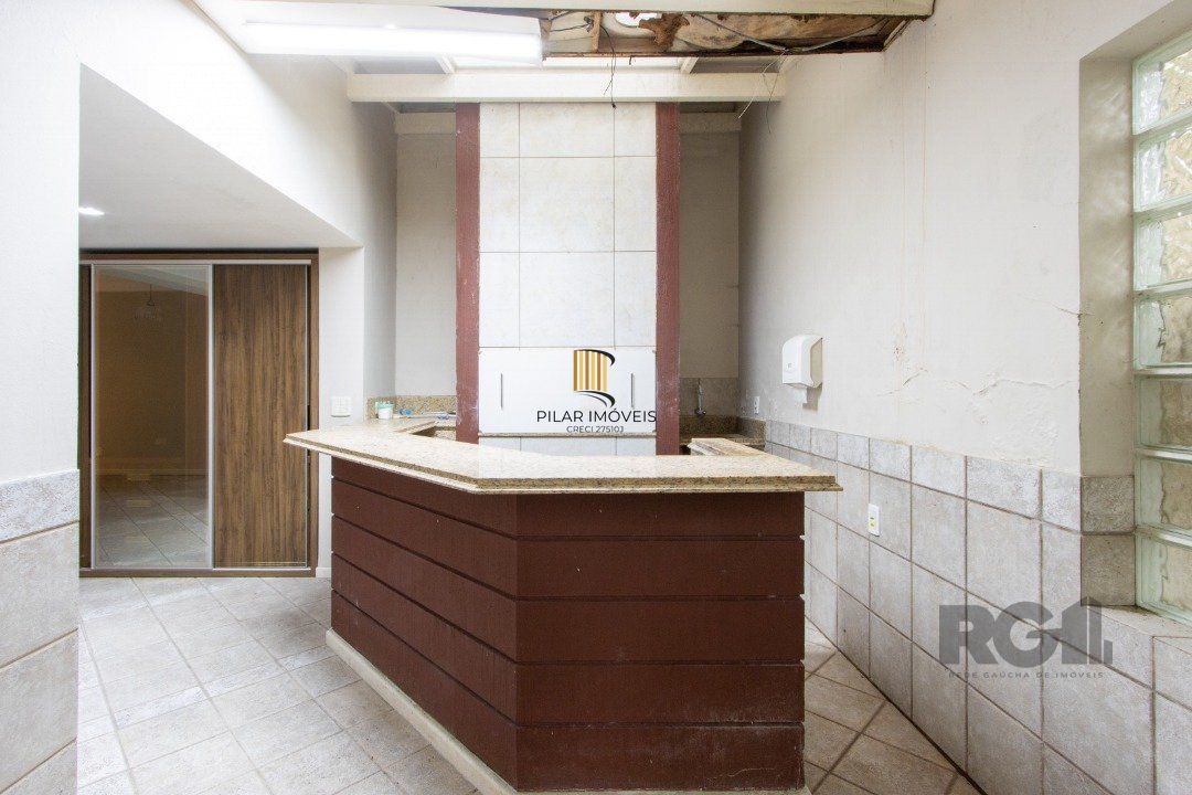 Excelente casa comercial com aproximadamente 300m² de área construída