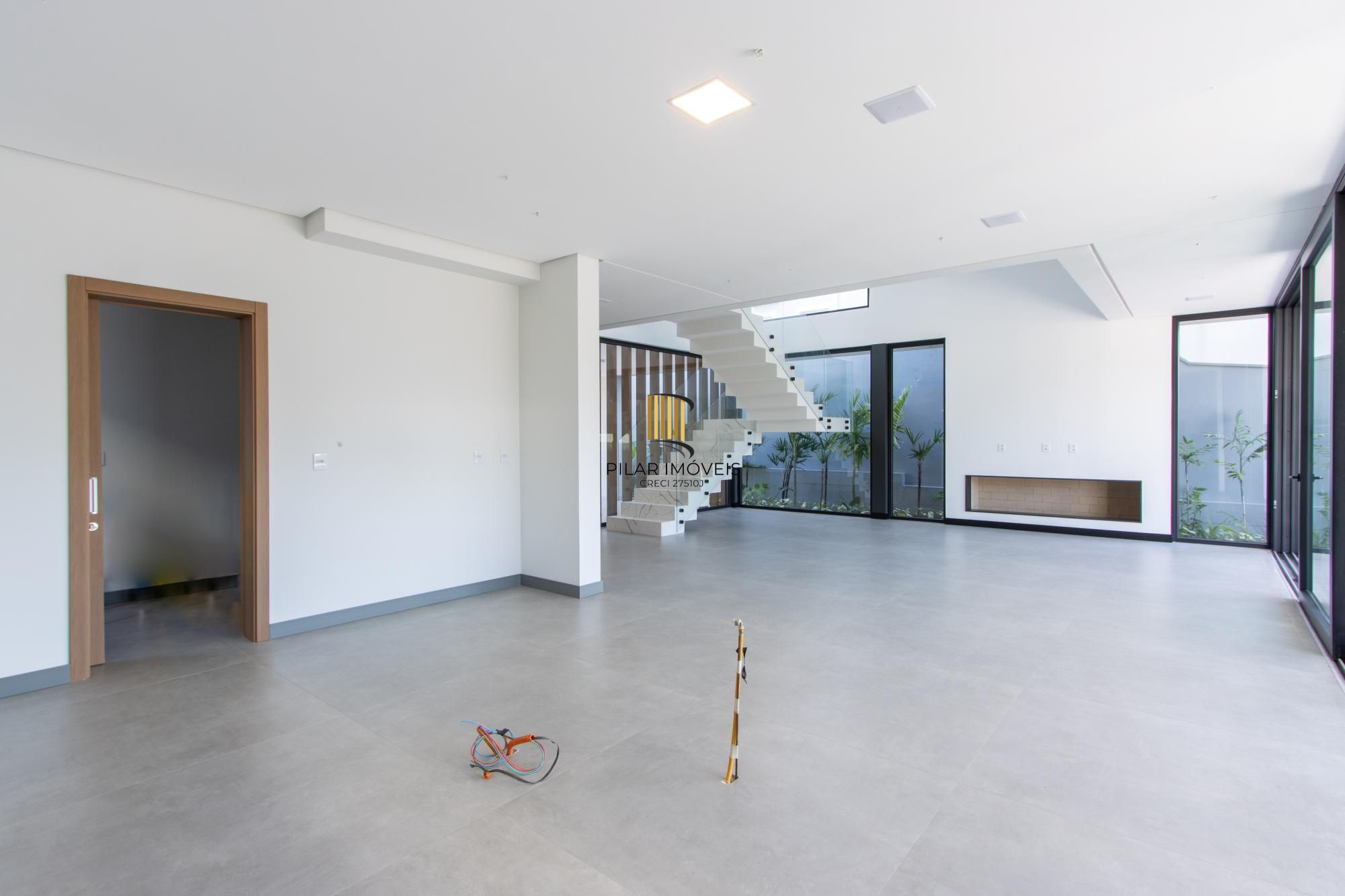 Casa de Condomínio 4 dormitórios no bairro Vila Nova