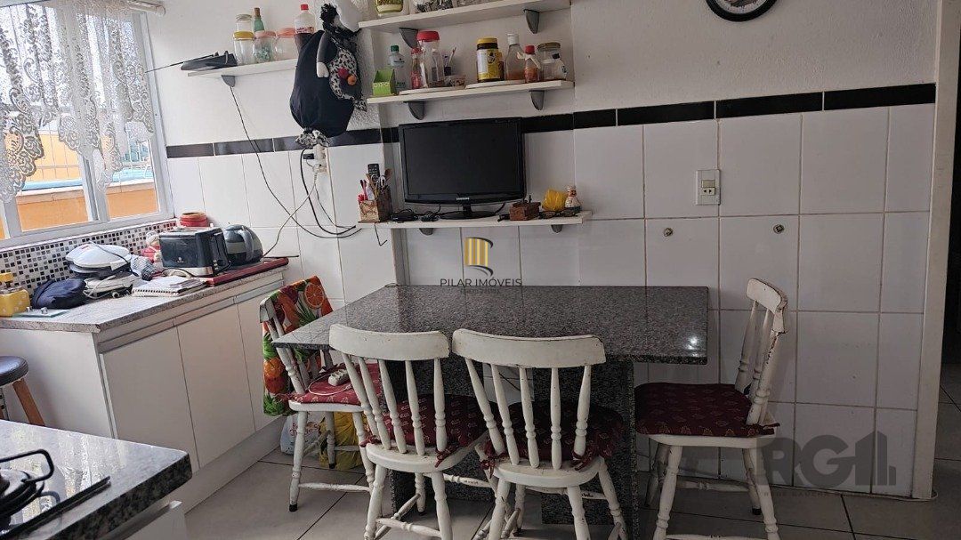 Casa 4 dormitórios no bairro Vila Assunção