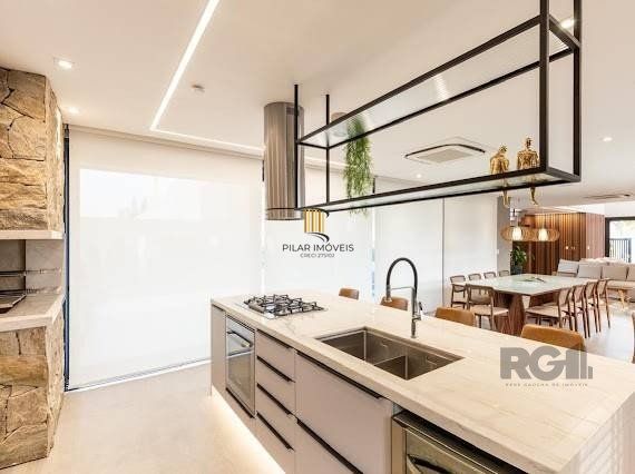 Casa 5 dormitórios no bairro Atlântida