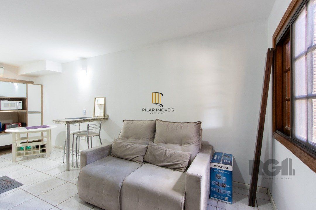 Casa de Condomínio 3 dormitórios no bairro Camaquã