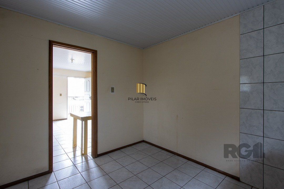 Casa 5 dormitórios no bairro Ipanema