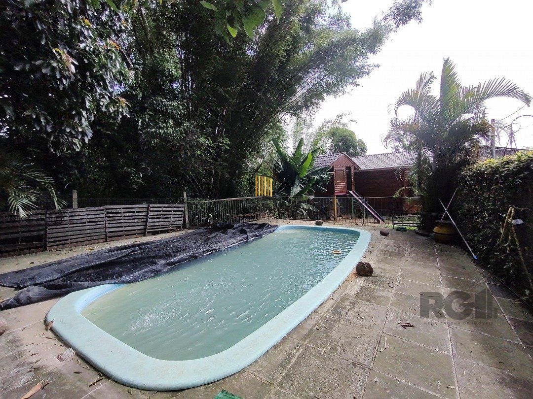 Casa térrea, 2 quartos, edícula com 2 quartos, pático, piscina - Bairro Cavalhado