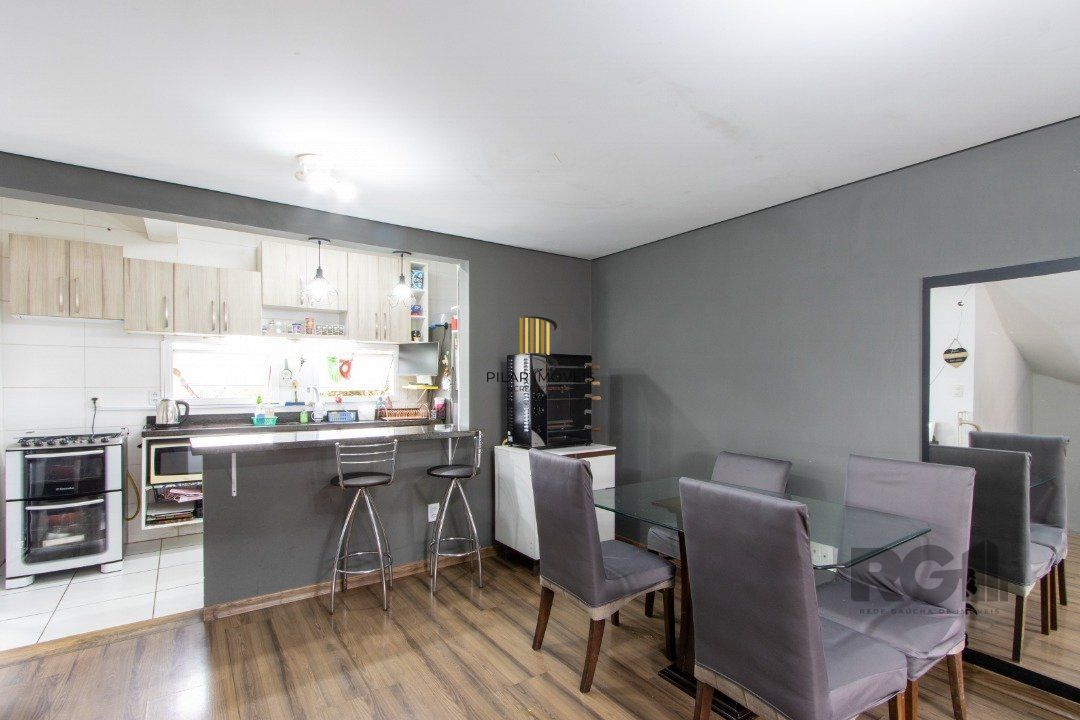 Casa 3 dormitórios no bairro Camaquã