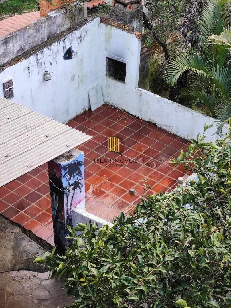 Casa 4 dormitórios no bairro Santa Tereza