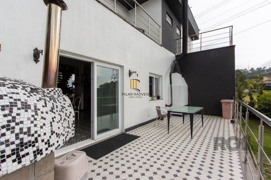 Casa de Condomínio 4 dormitórios no bairro Vila Nova