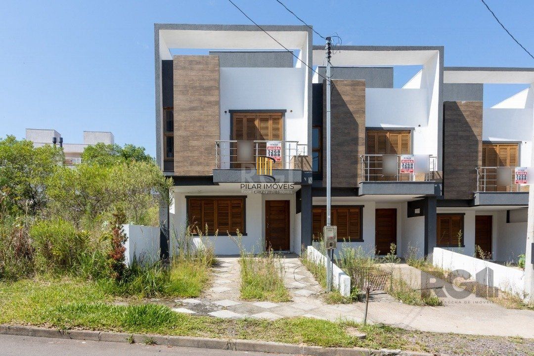 Casa 3 dormitórios no bairro Guarujá - Pilar Imóveis