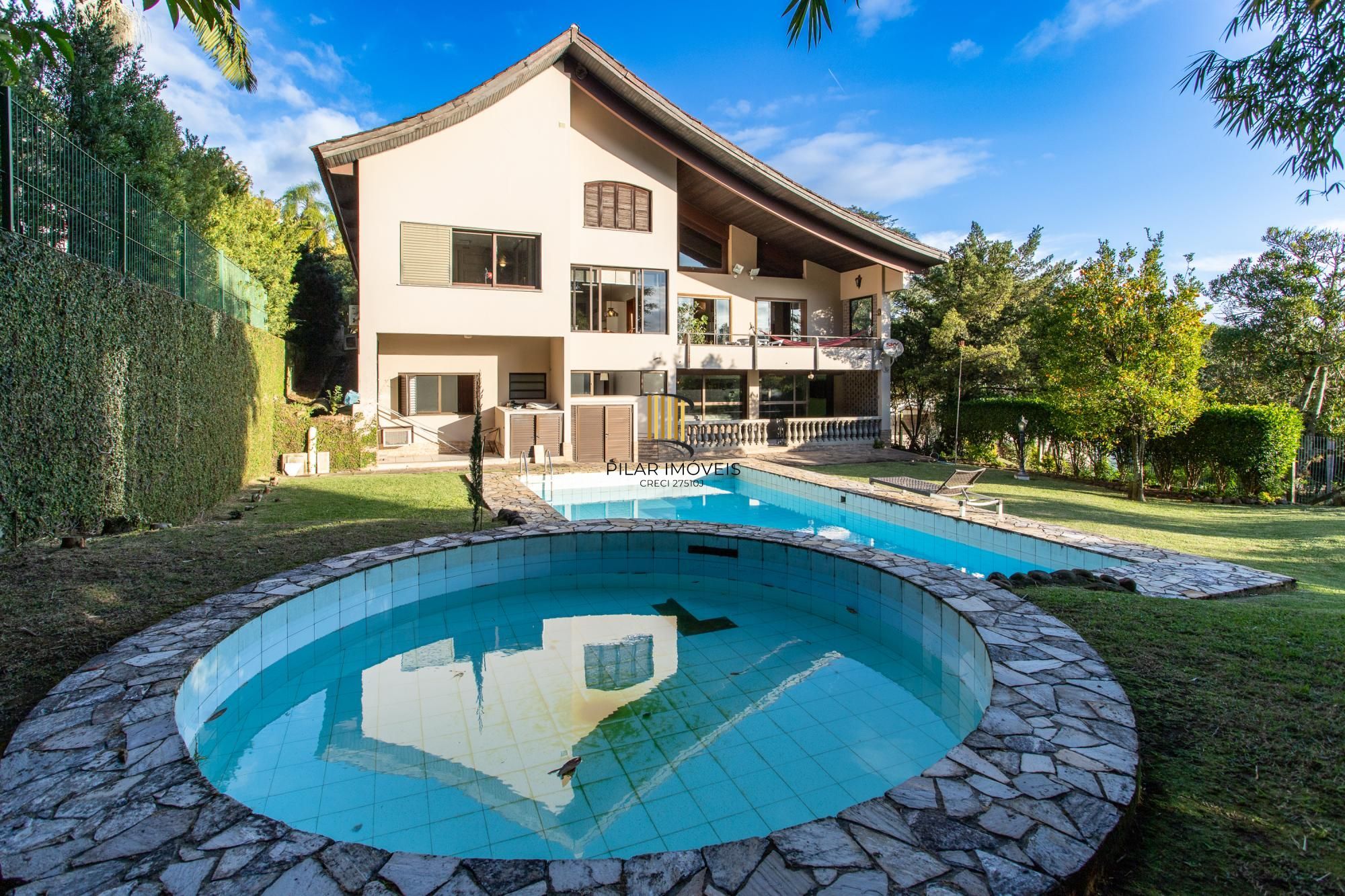 Casa em Condomínio à venda com 5 dormitórios, 565m² e 4 vagas no Condominio Jardim do Sol, Zona Sul de Porto Alegre