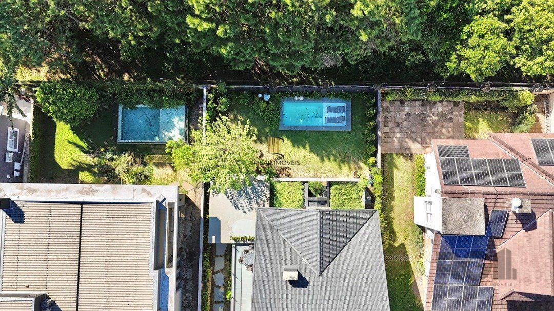 Casa de Condomínio 4 dormitórios no bairro Atlântida
