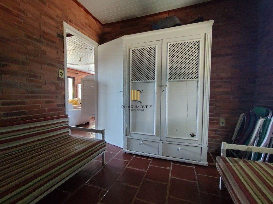 Casa 5 dormitórios no bairro Atlântida