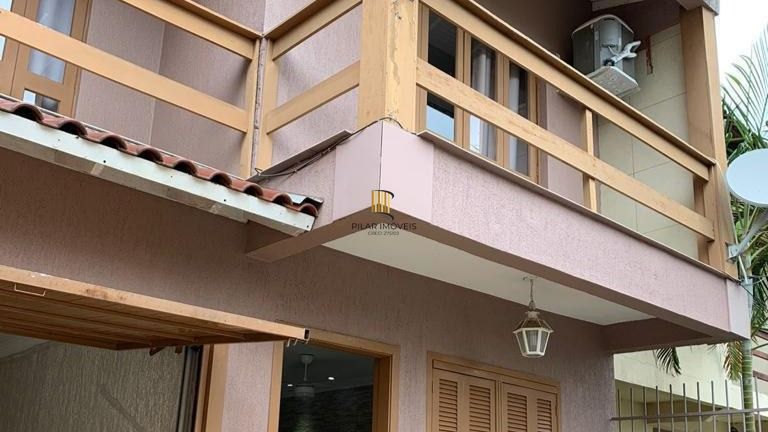 Casa 5 dormitórios no bairro Jardim Algarve