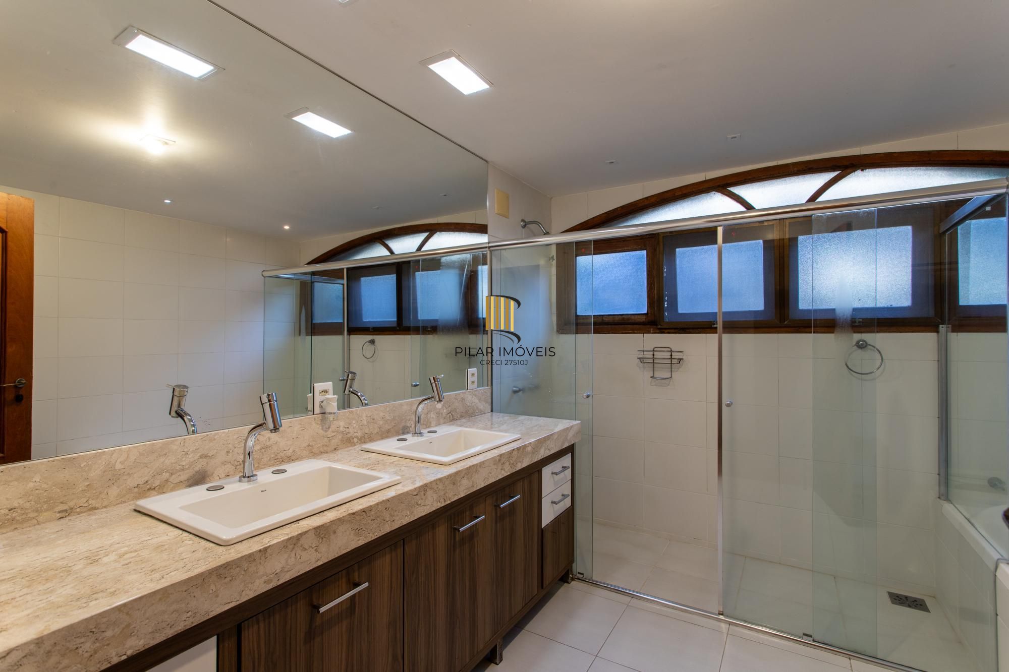 Casa em Condomínio à venda com 5 dormitórios, 565m² e 4 vagas no Condominio Jardim do Sol, Zona Sul de Porto Alegre