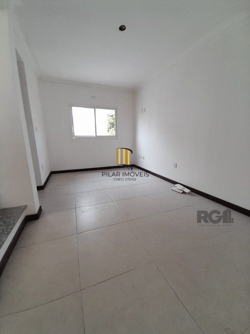Casa de Condomínio 3 dormitórios no bairro Camaquã