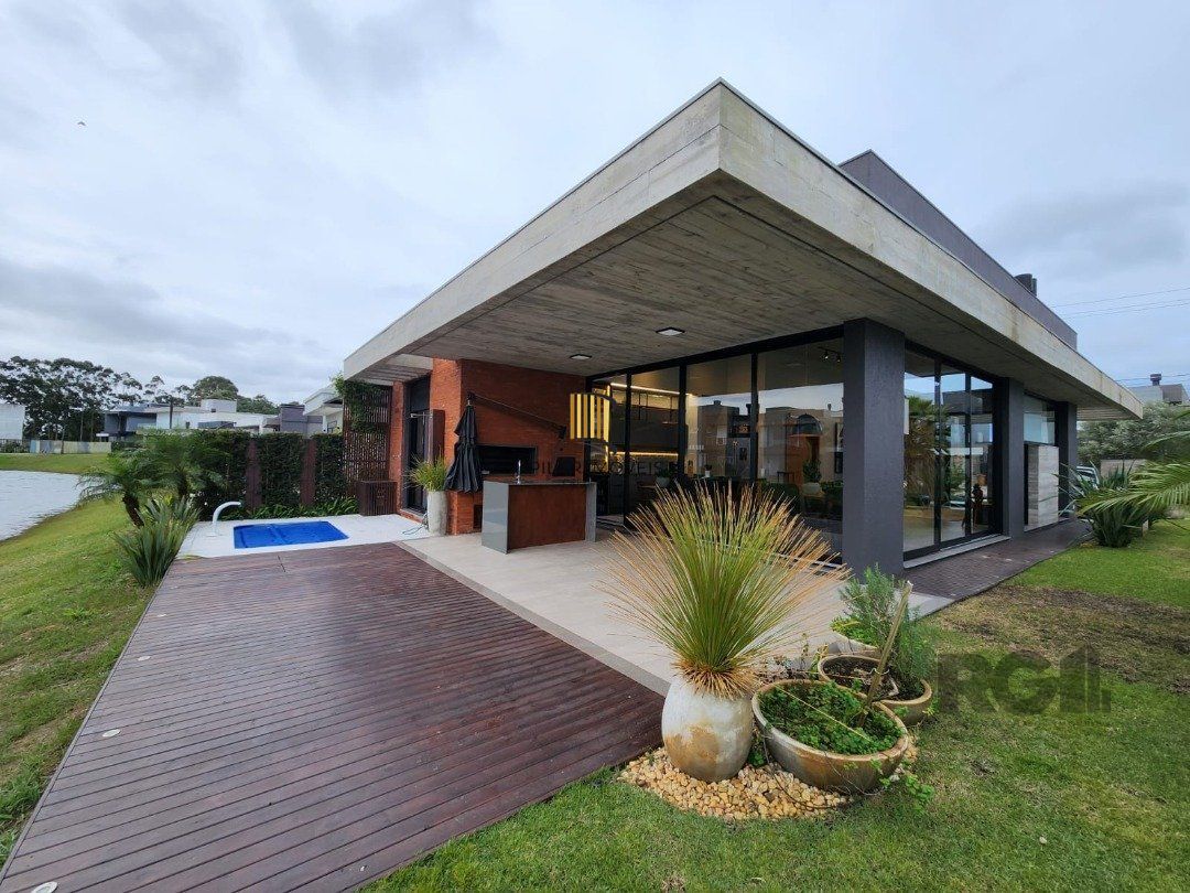 Casa de Condomínio 4 dormitórios no bairro Capão Ilhas Resort - Pilar Imóveis
