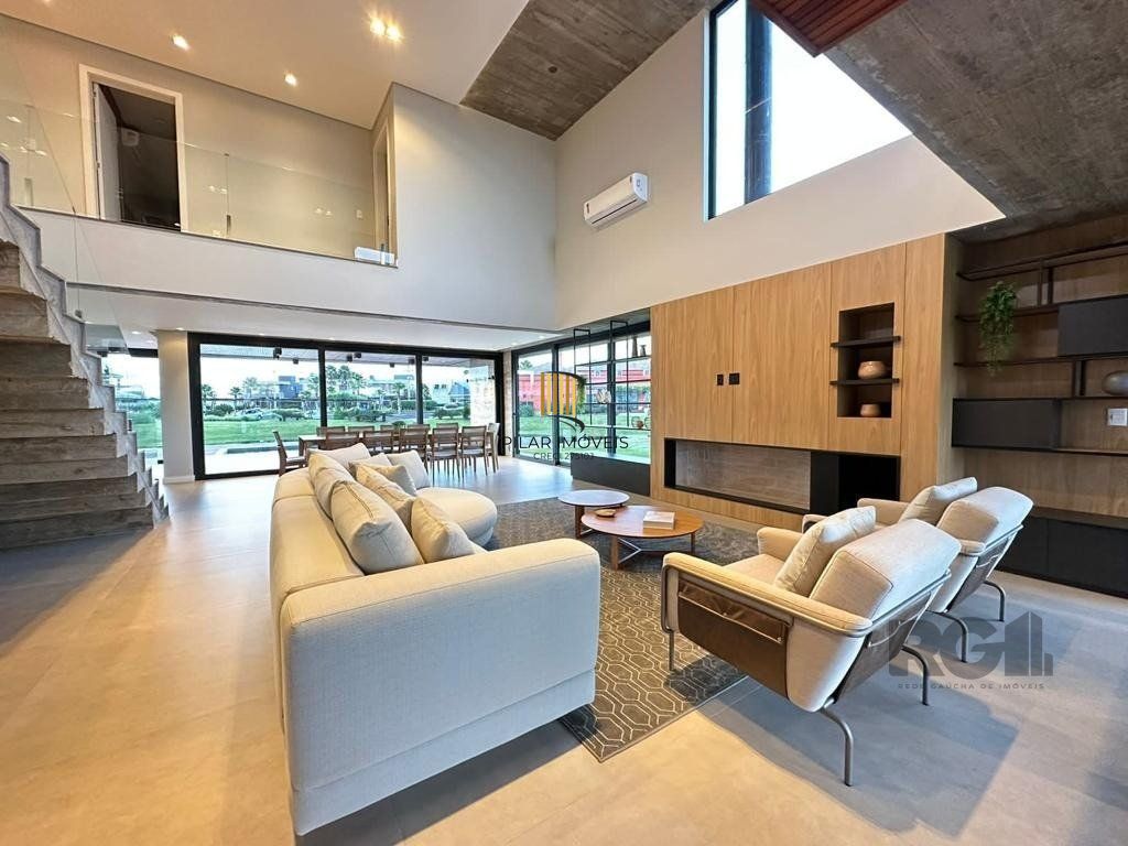 Casa de Condomínio 6 dormitórios no bairro Atlântida Sul