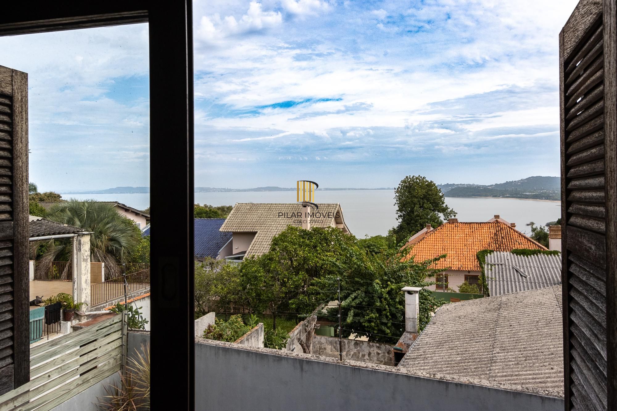 Casa com 6 quartos à venda  bairro Espírito Santo, Porto Alegre.