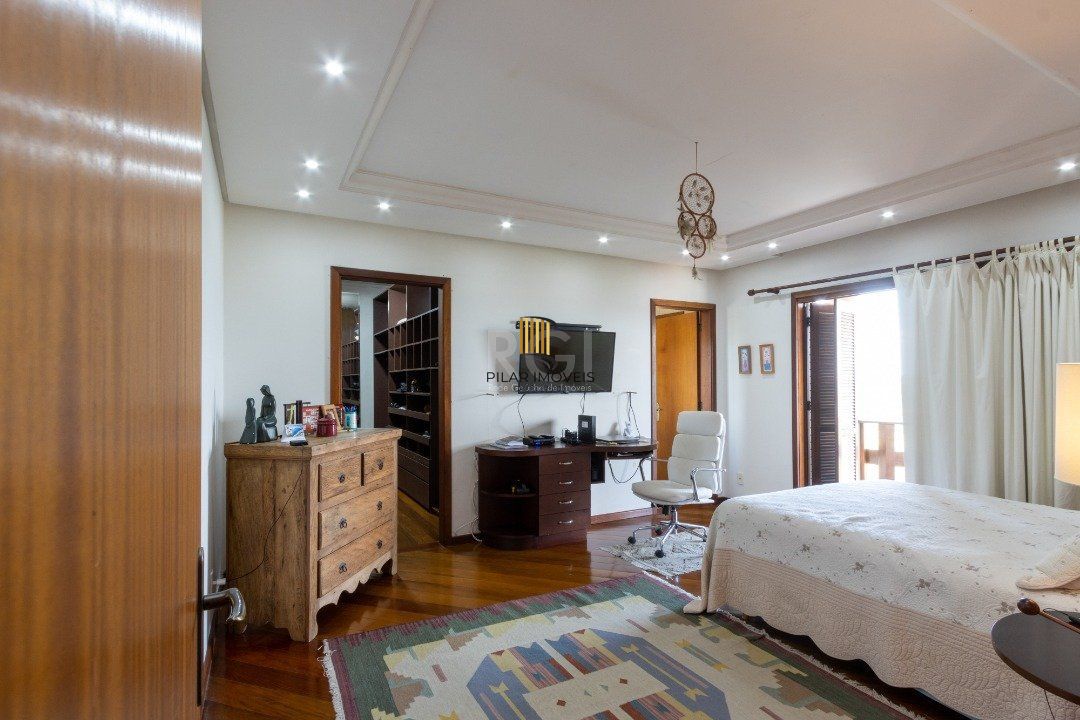 Casa de Condomínio 4 dormitórios no bairro Nonoai