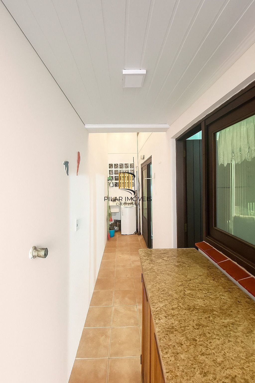 Apartamento com 2 dormitórios e garagem em Torres