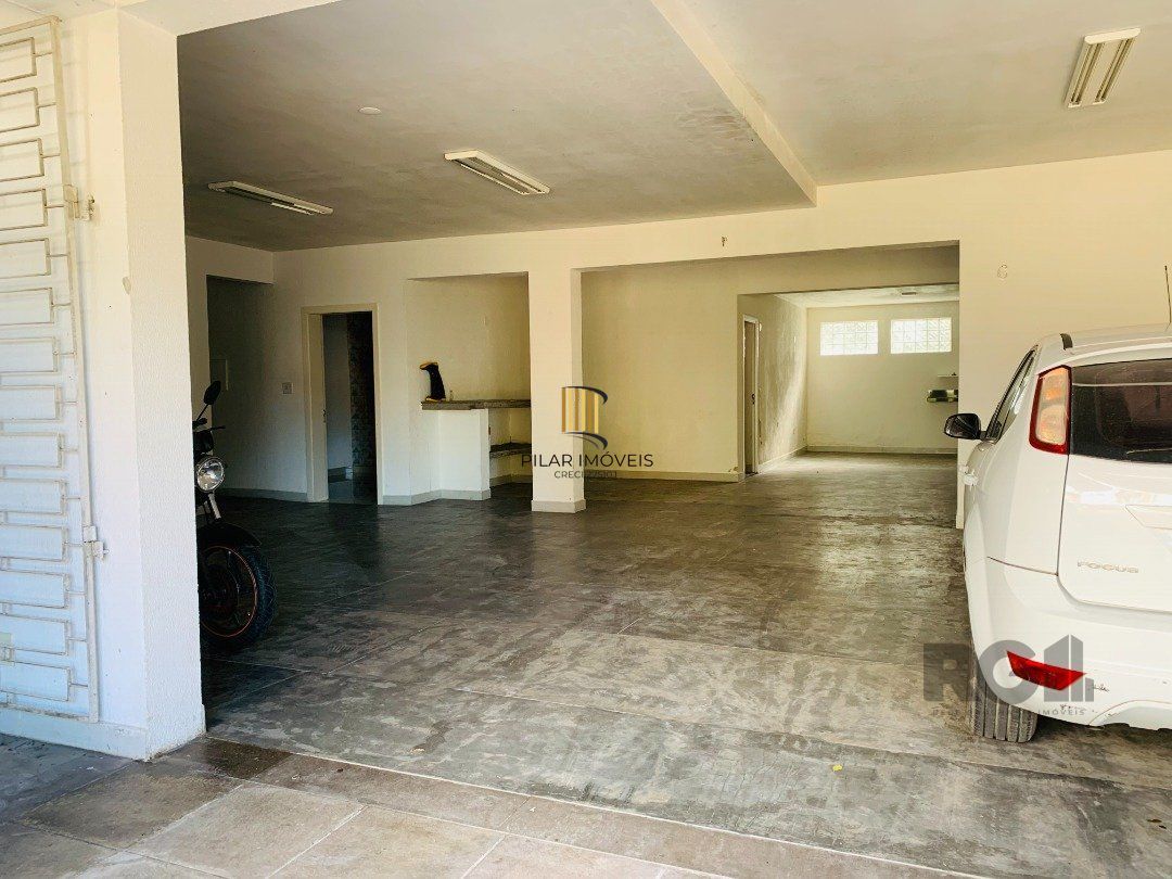 Casa de Condomínio 3 dormitórios no bairro Lomba do Pinheiro