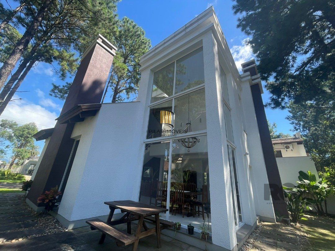 Casa de Condomínio 3 dormitórios no bairro Atlântida Sul - Pilar Imóveis