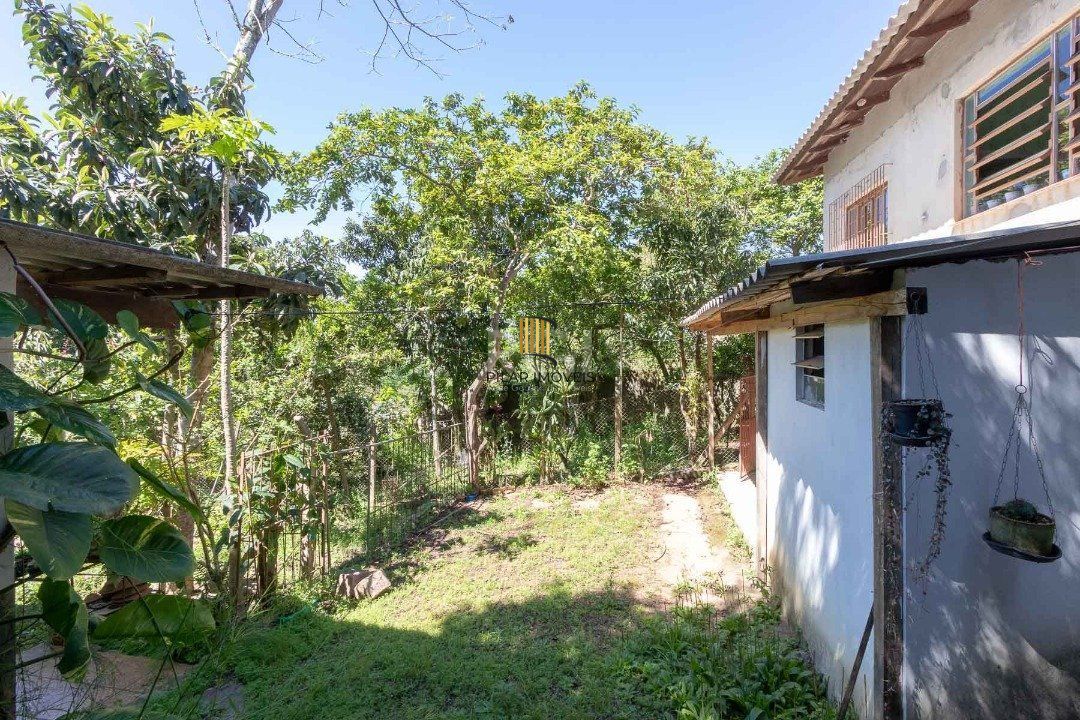 Casa para Venda - 370m², 4 dormitórios, sendo 1 suites, 6 vagas - Lomba do Pinheiro