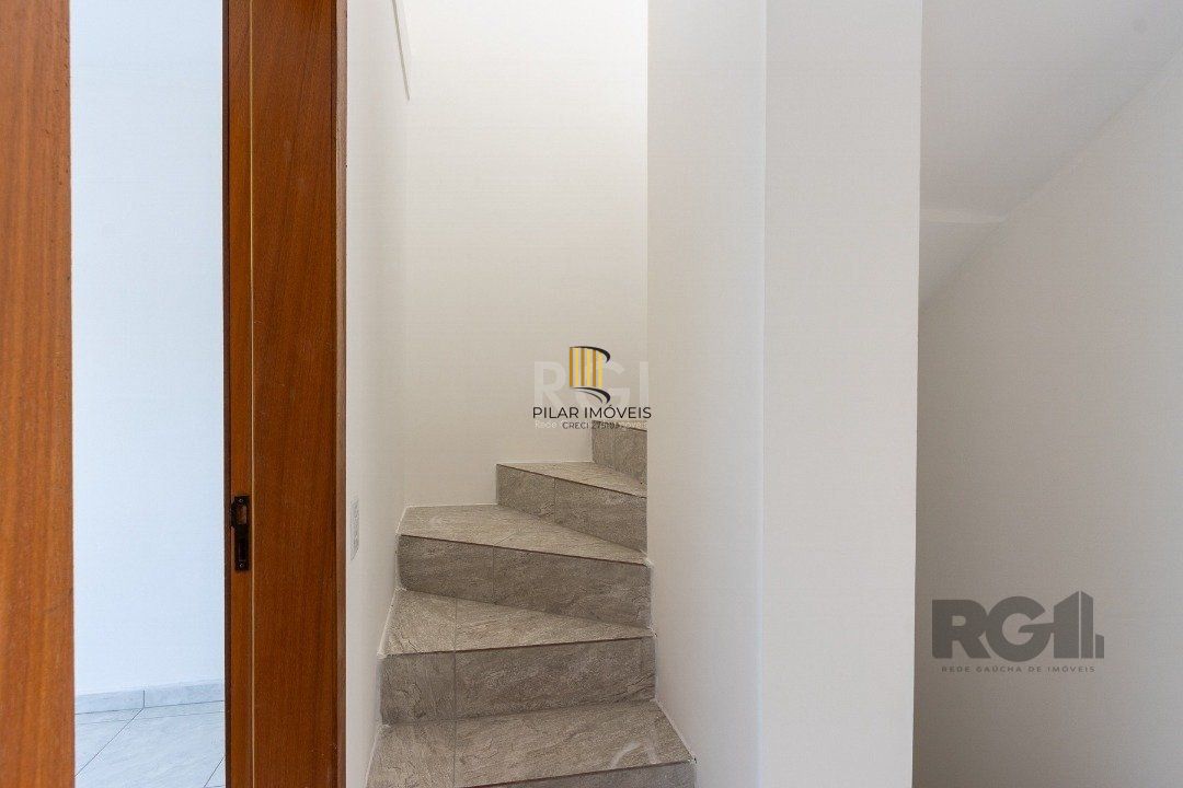 Casa 3 dormitórios no bairro Guarujá