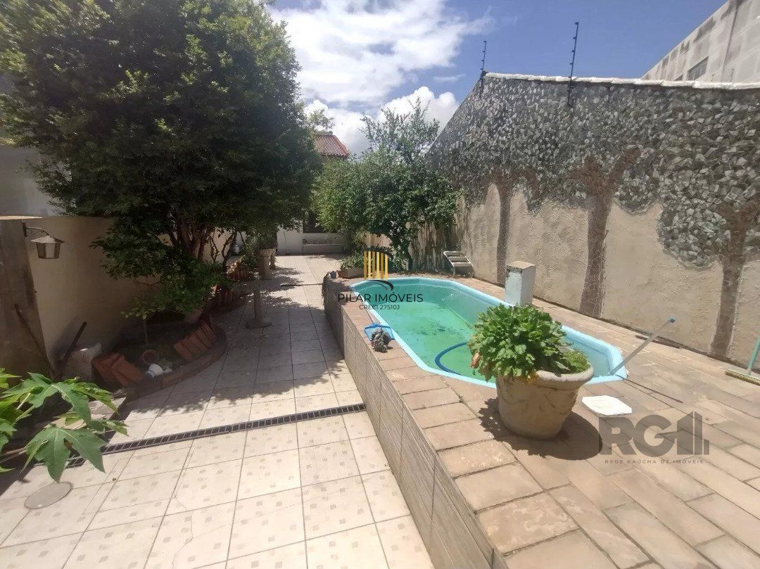 Casa 4 dormitórios, Bairro Cavalhada.