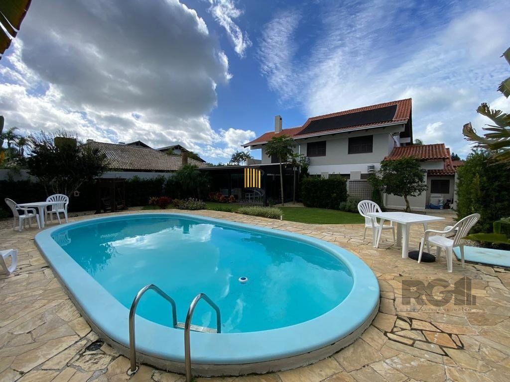 CASA EM ATLANTIDA COM 5 SUÍTES
