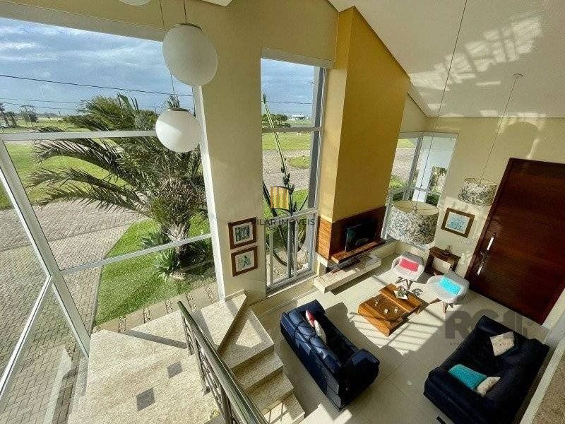 Casa de Condomínio 4 dormitórios no bairro Atlântida Sul