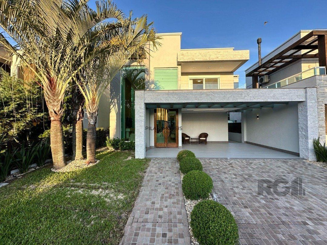 Casa de Condomínio 4 dormitórios no bairro Praia da Conceição - Pilar Imóveis