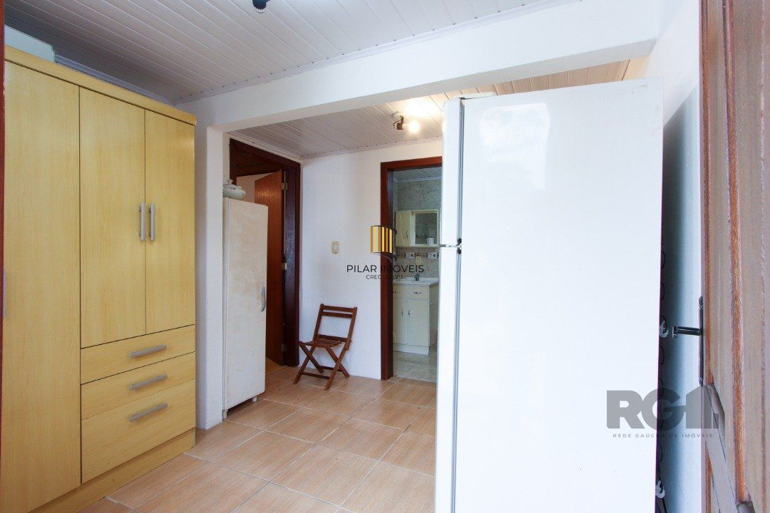 Casa térrea com  hall de entrada ,4 dormitórios