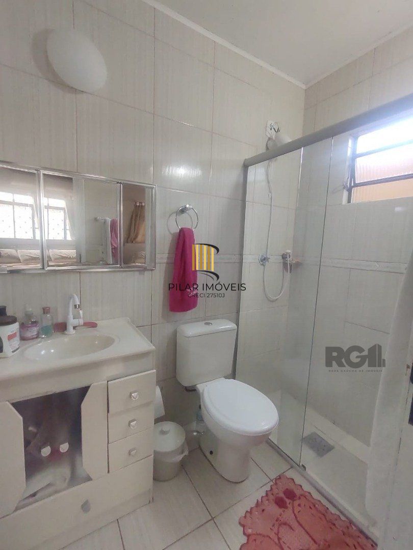 Casa de 3 dormitórios, 1 suíte e 2 vagas de garagem em Viamão.