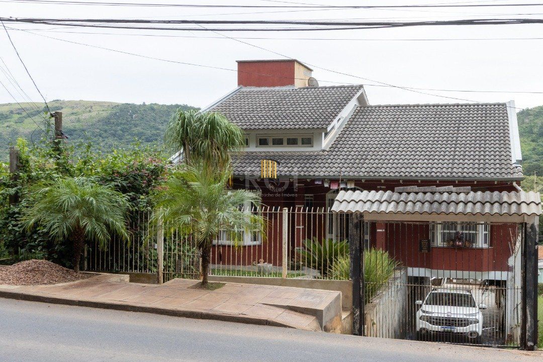 Casa 4 dormitórios no bairro Hípica - Pilar Imóveis