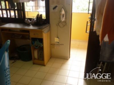casa com 4 dormitórios, sendo uma suíte , e 530 area privativa