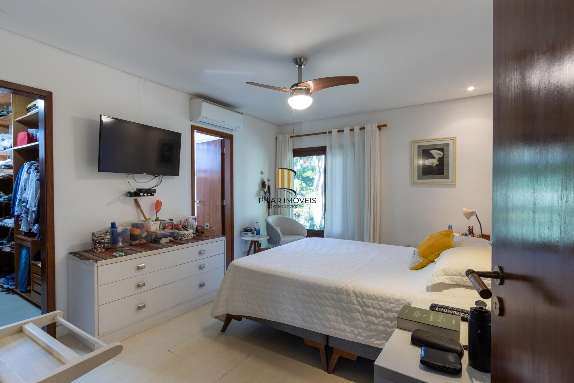 Casa de Condomínio 4 dormitórios no bairro Cavalhada