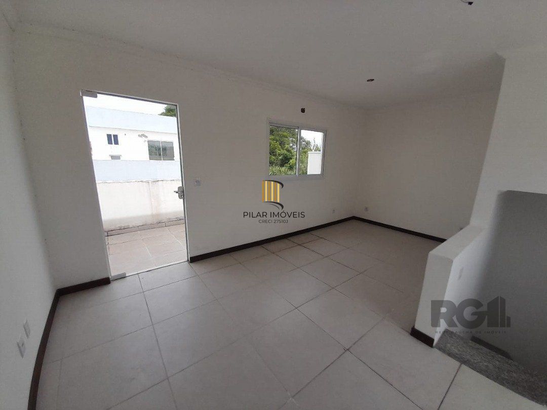Casa 3 dormitórios no bairro Camaquã
