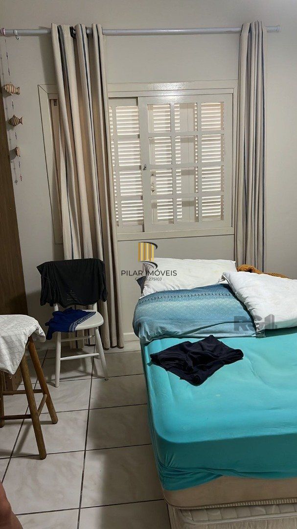 Casa 5 dormitórios no bairro Atlântida