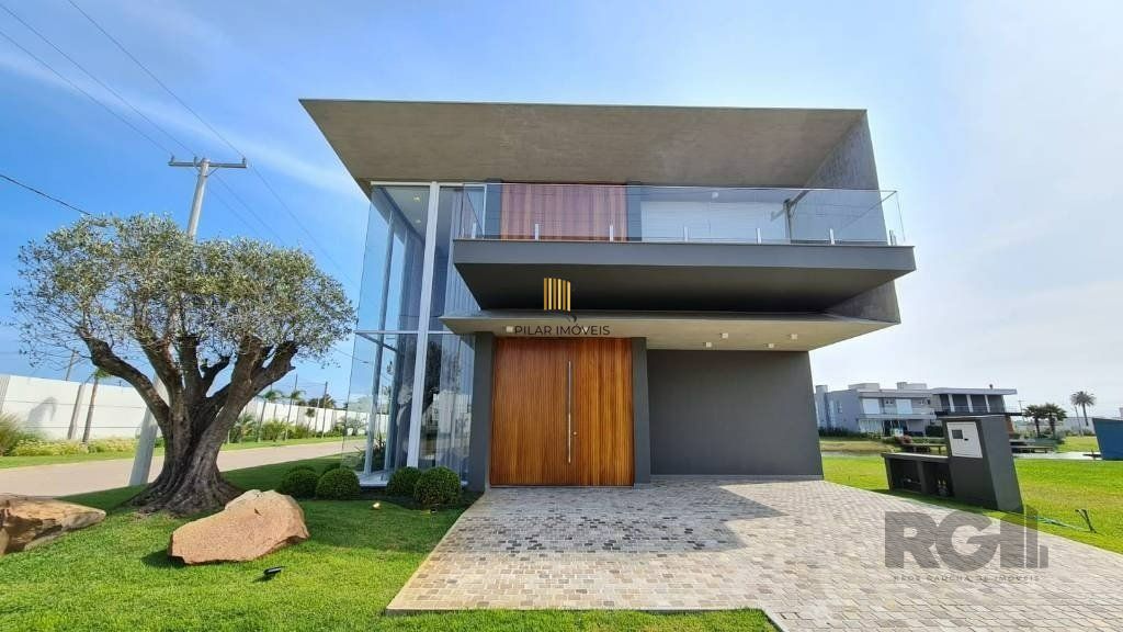 Sobrado Beira Lago com piscina e Deck com 457m² e 5 suítes no Condomínio Sense em Xangri-lá