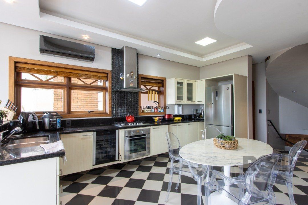 Casa para Venda com 4 dormitórios, sendo 2 suites e 4 vagas no bairro Jardim Isabel