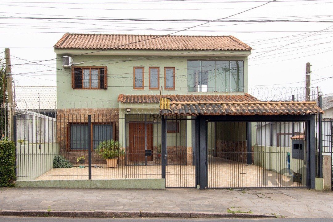 Casa 6 dormitórios no bairro Tristeza - Pilar Imóveis