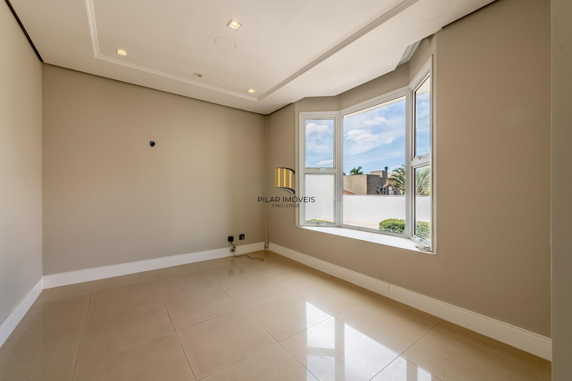 Casa de 4 dormitórios no bairro Três Figueiras