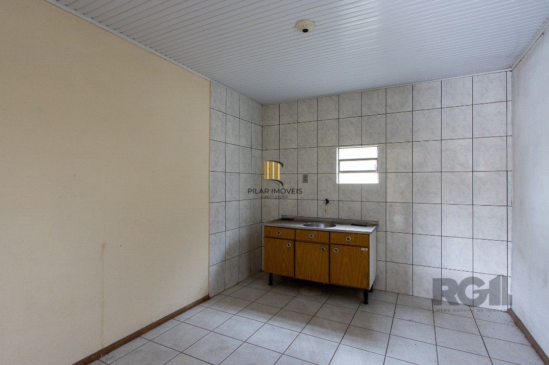 Casa 5 dormitórios no bairro Ipanema