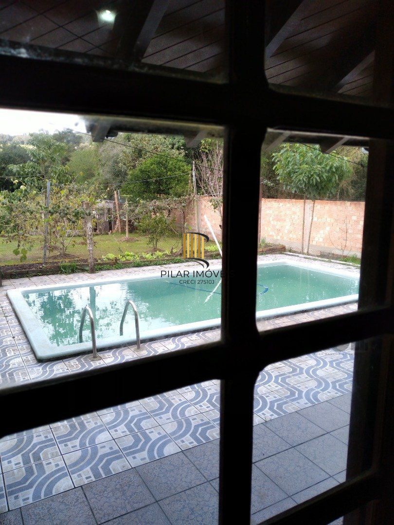 Casa 4 dormitórios no bairro Restinga