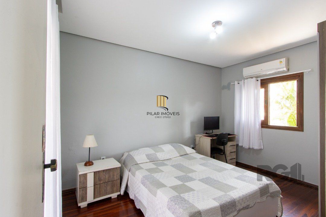 Casa 3 dormitórios no bairro Camaquã