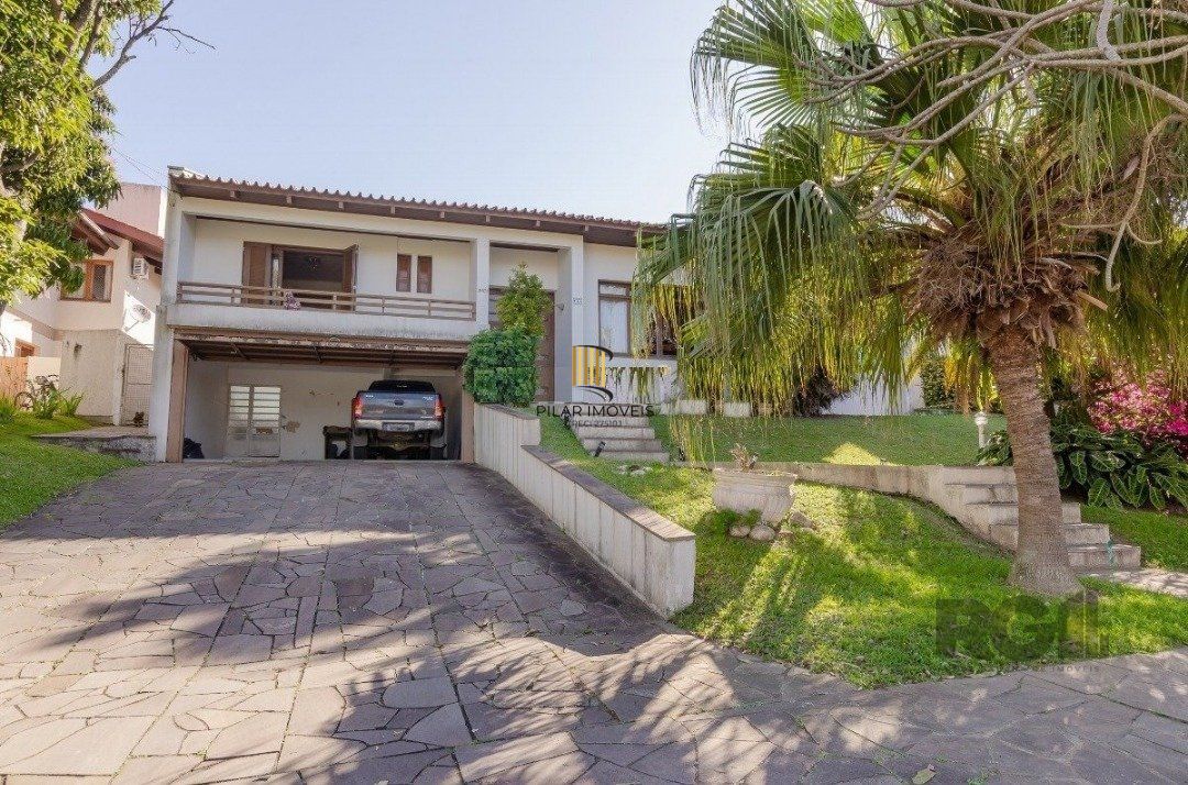 Casa de Condomínio 3 dormitórios no bairro Cavalhada