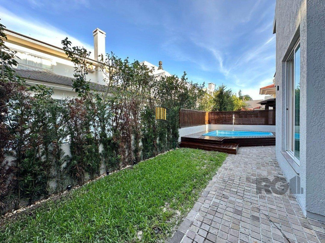 Casa de Condomínio 4 dormitórios no bairro Praia da Conceição