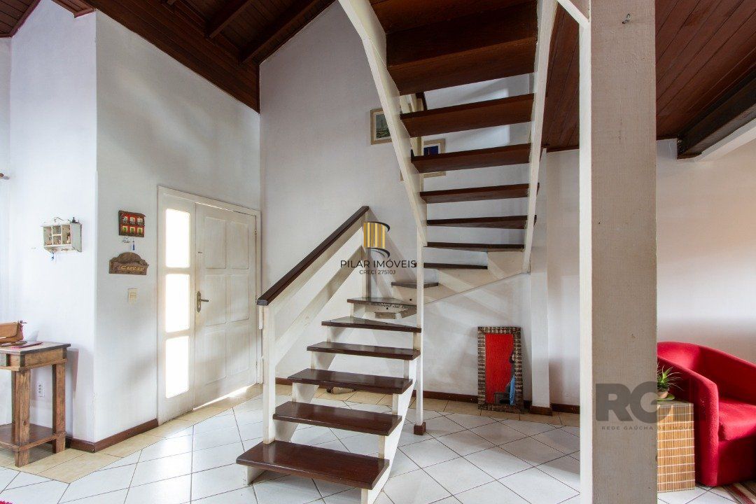 Casa 3 dormitórios no bairro Camaquã