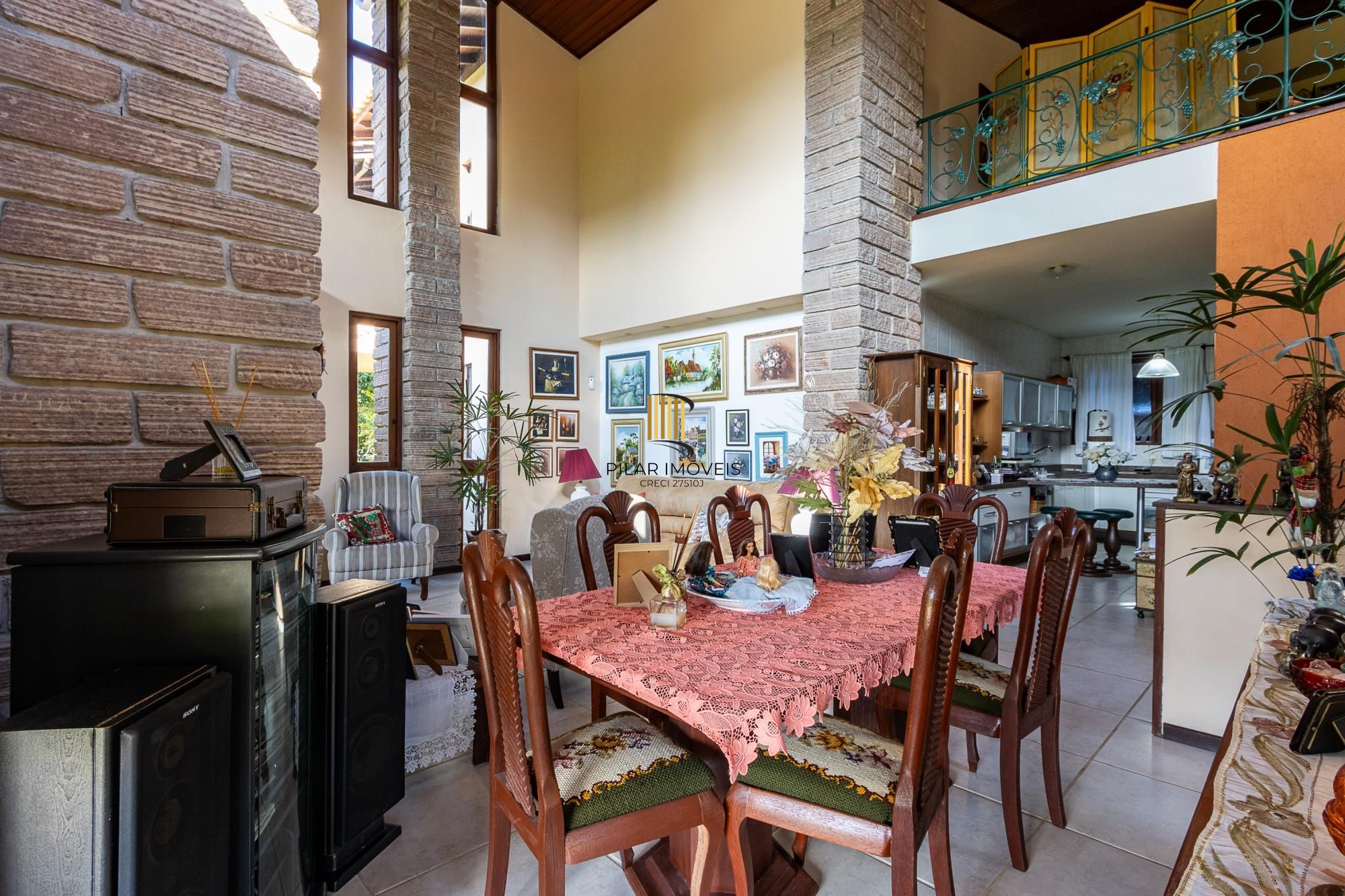 Casa em condomínio á venda com 6 dormitórios em Porto Alegre