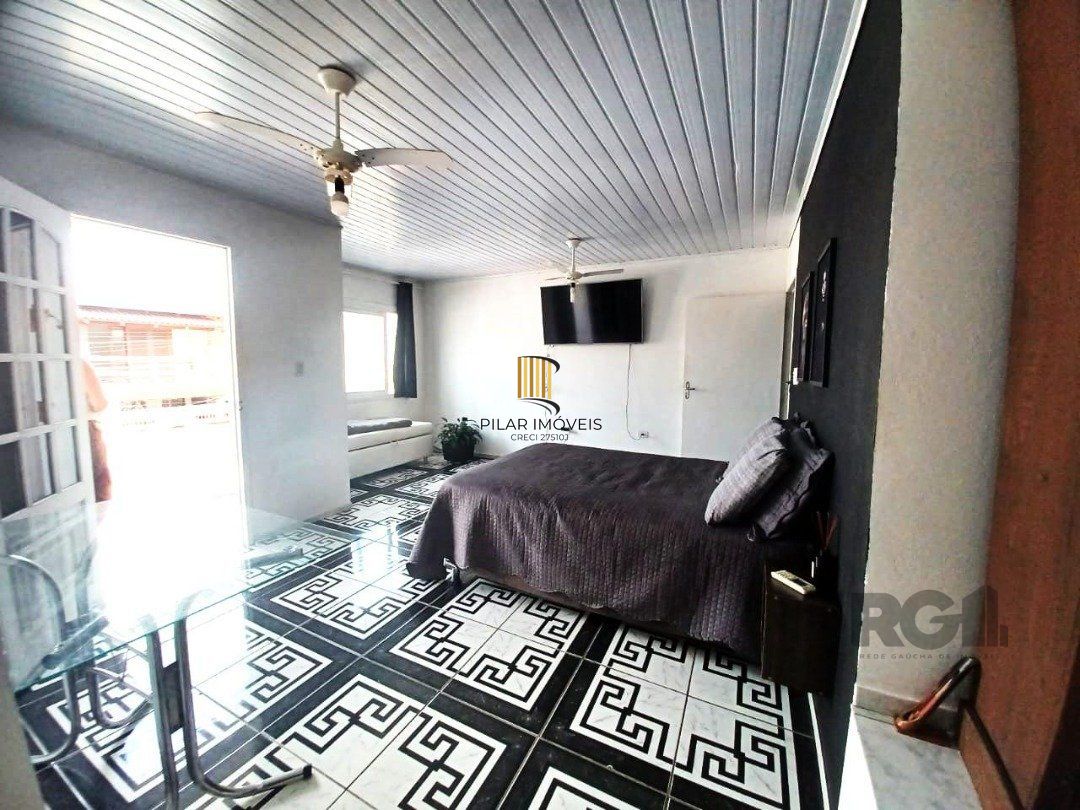 Casa 4 dormitórios no bairro Navegantes